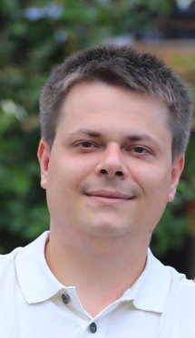 Максим Скрекеря