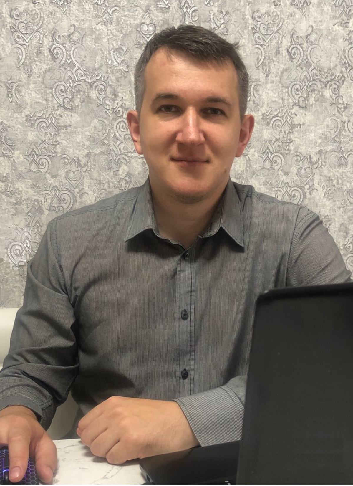 Роман Мельников
