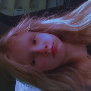 Оля Унжакова