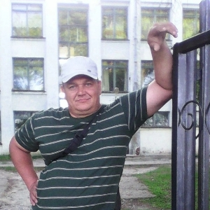 Евгений Телли