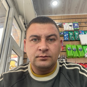 Роман Корень