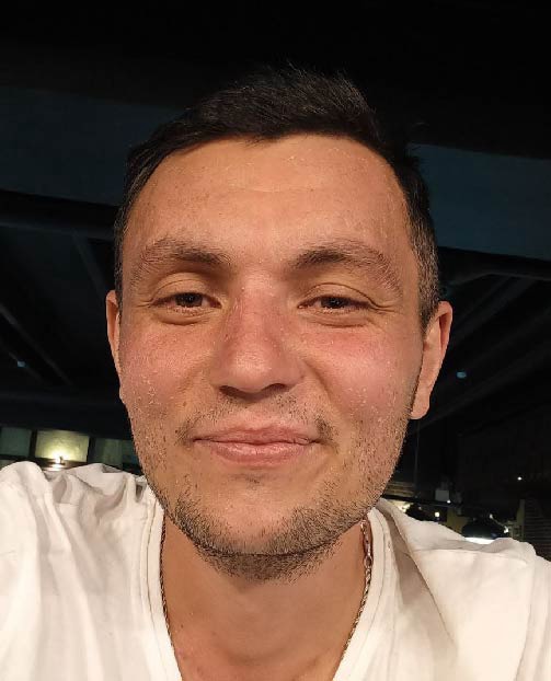 Максим Романец