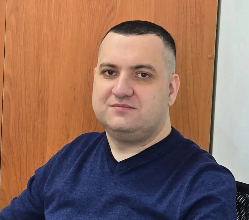 Денис Попов