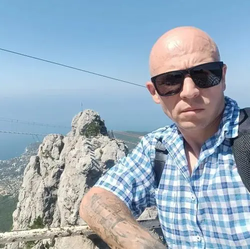 Денис Устинов
